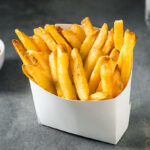 Homemade Fast Food Golden French Fries with Tomato Ketchup